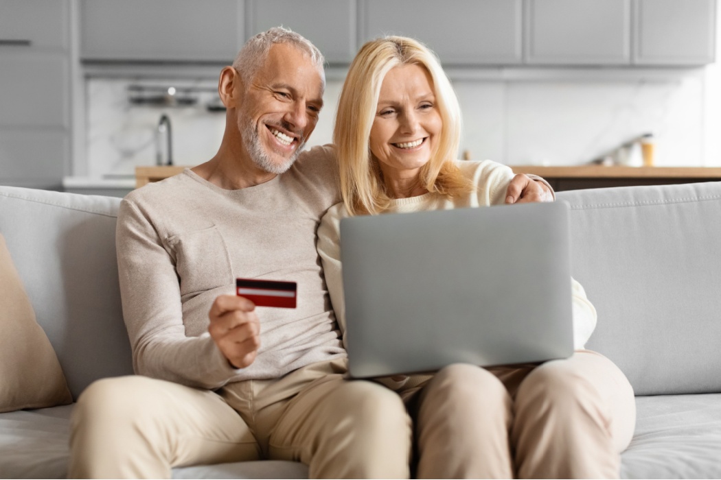 Happy couple shopping online