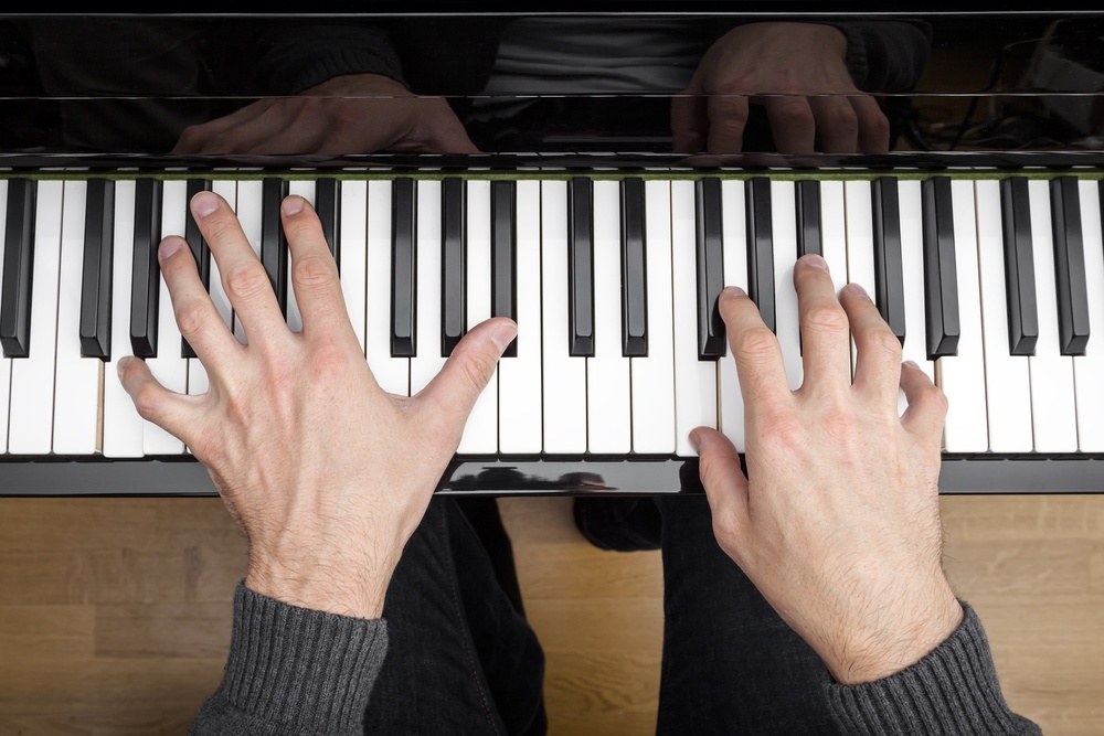 A person playing a piano.
