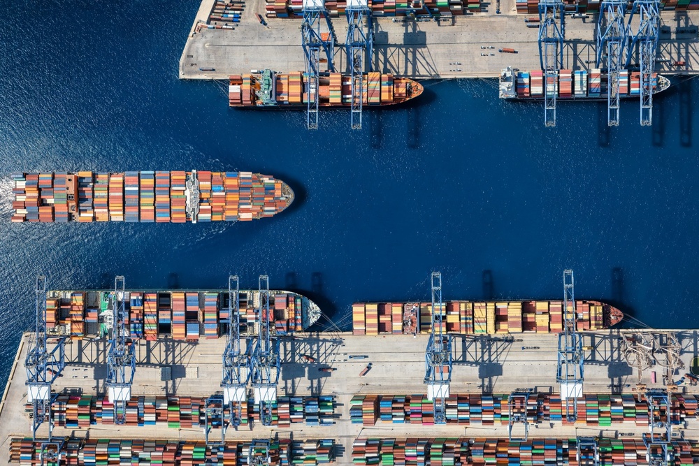 An aerial view of a cargo ship harbour.